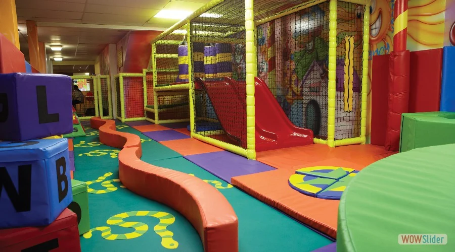 Clown About's colourful multi-level soft play structure at Outburst